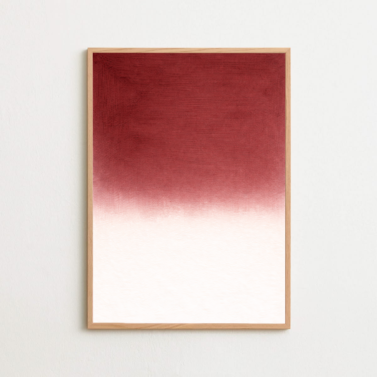 Framed artwork with a gradient from red to white on a light gray background