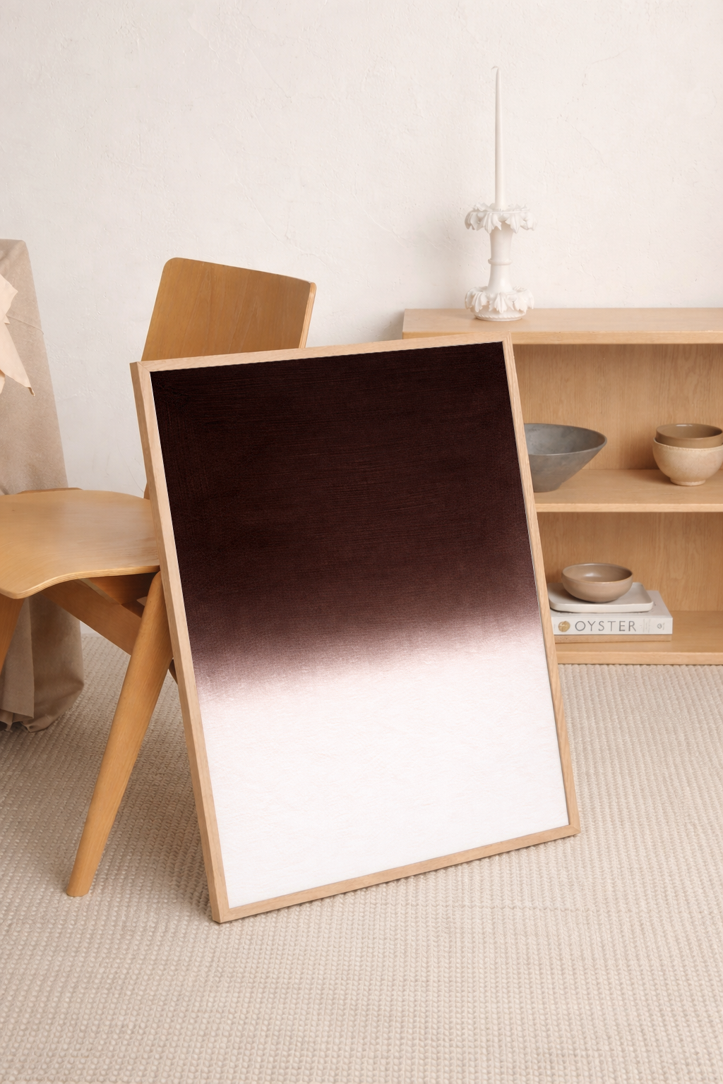 Large gradient mirror with wooden frame on a neutral background