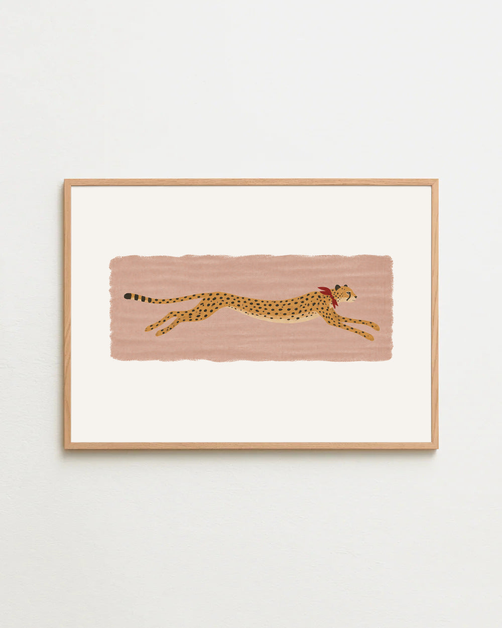 the long sprint, a cheetah at full stride with a red scarf on dusty rose, in a wooden frame