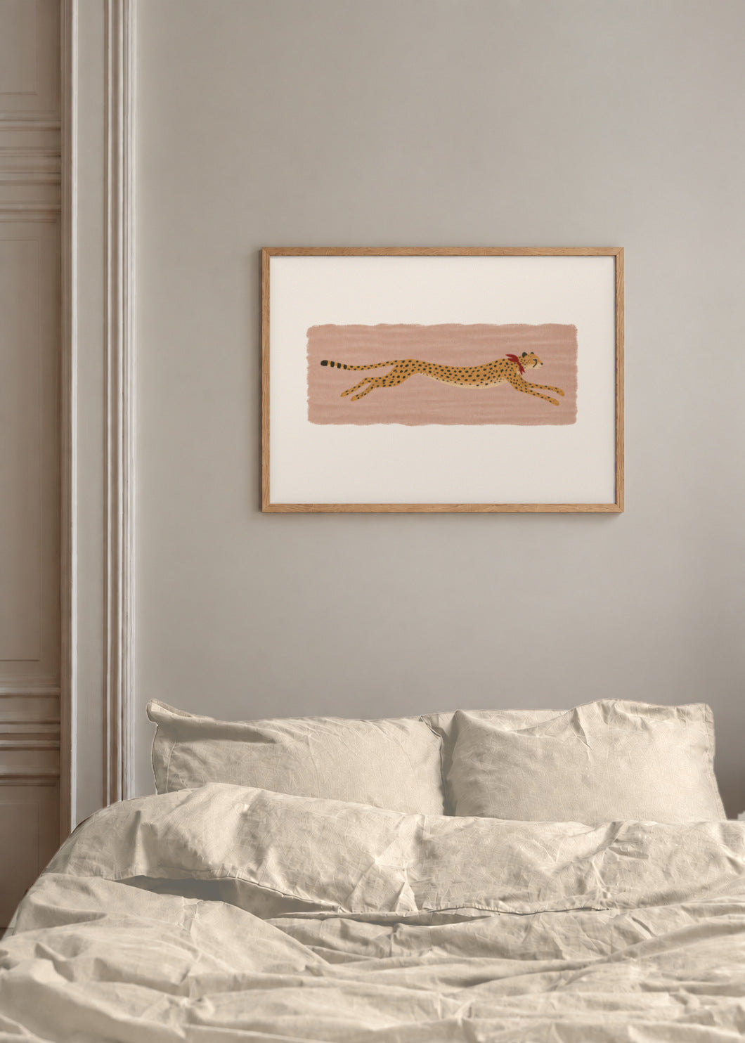 the long sprint, framed above a bed with warm linen bedding