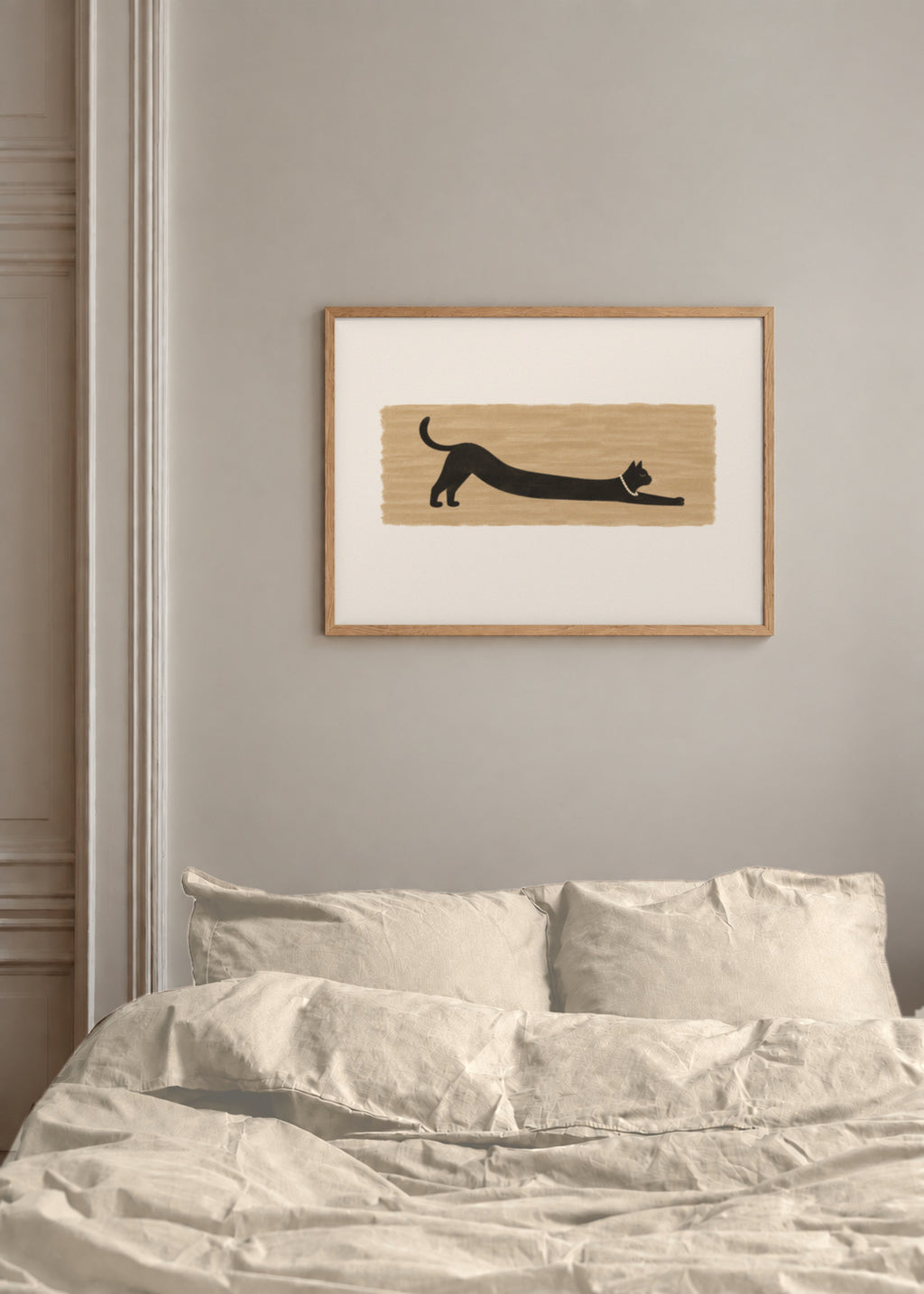 the long stretch, framed above a bed with warm linen bedding