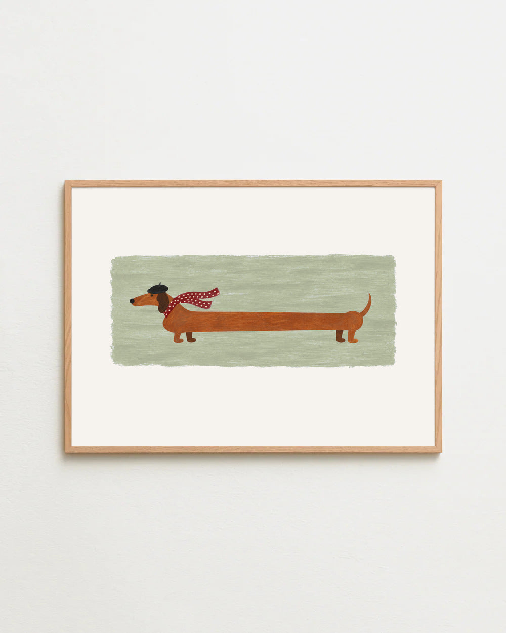 the long walk in sage, a long dachshund in a beret and scarf, in a wooden frame